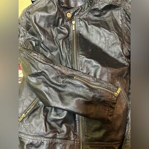 Vintage Wilson’s leather jacket, moto style size large. Organically distressed.